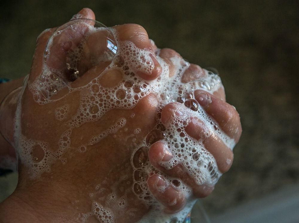 Soap bubbles on hands