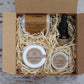 Collection of products suitable for sensitive skin in kraft card gift box with cream shredded paper