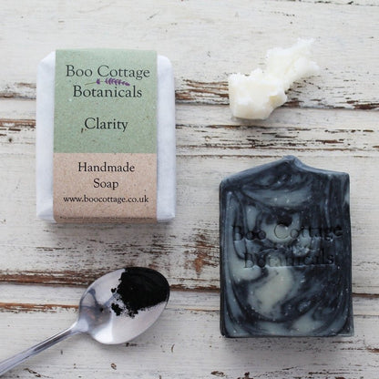 Boo Cottage Botanicals Clarity handmade soap with natural ingredients on rustic wood surface